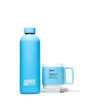 Load image into Gallery viewer, Cuppa water bottle in blue and blue cuppa mug in blue on white background
